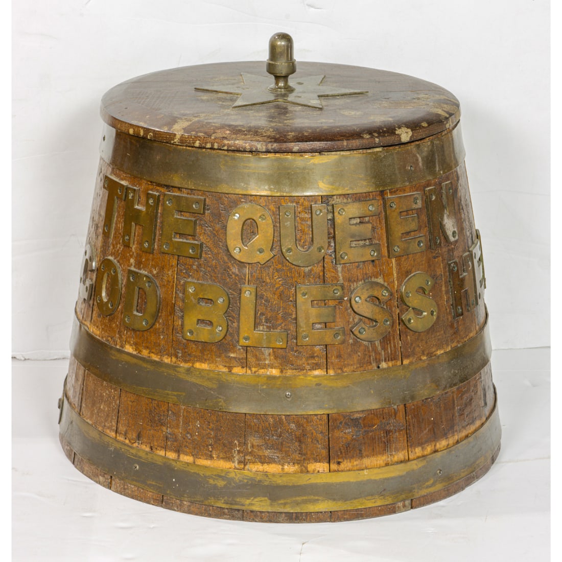 An unsigned lidded cooper barrel, "The Queen God Bless Her," in brass nailed to the wood (1 of 4)