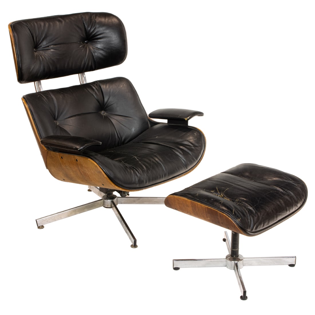 A Modern George Mulhauser for Plycraft (Massachusetts) tufted leather upholstered lounge chair with: A Modern George Mulhauser for Plycraft (Massachusetts) tufted leather upholstered lounge chair with ottoman, factory sticker applied underside of ottoman, circa 1950s; chair, 38"h x 32 1/2"w x 33"d; o