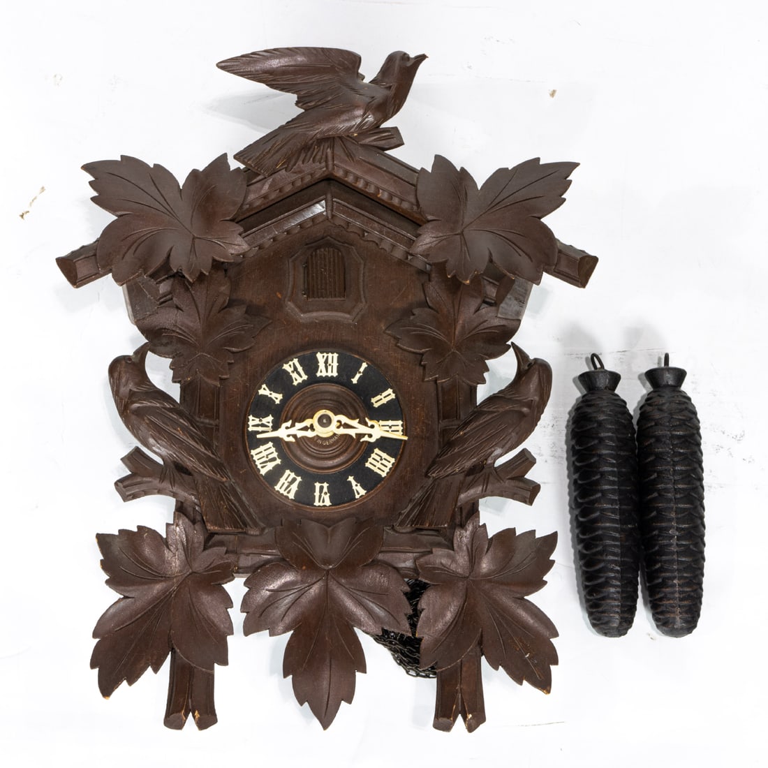 Two carved cuckoo clocks (1 of 3)