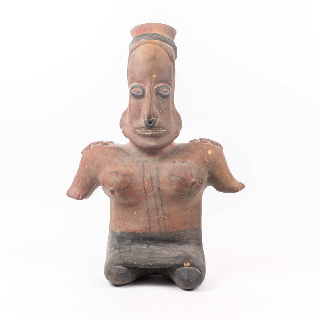 A Zapotec red clay seated figure: A Zapotec red clay seated figure, 16"h