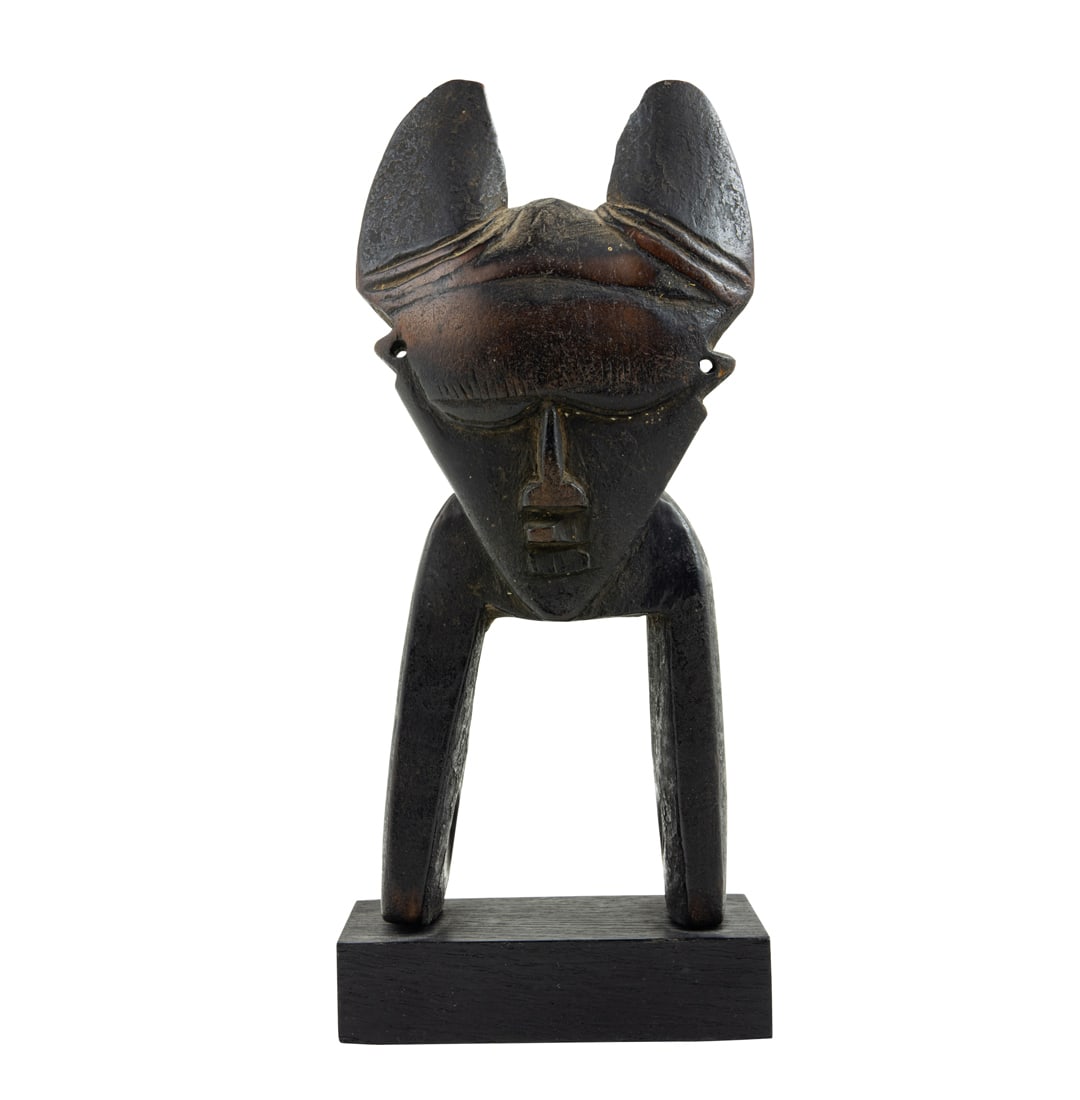 A large Baule Heddle horned head wood pulley carved with a heart shaped face, early 20th century, 7 (1 of 3)