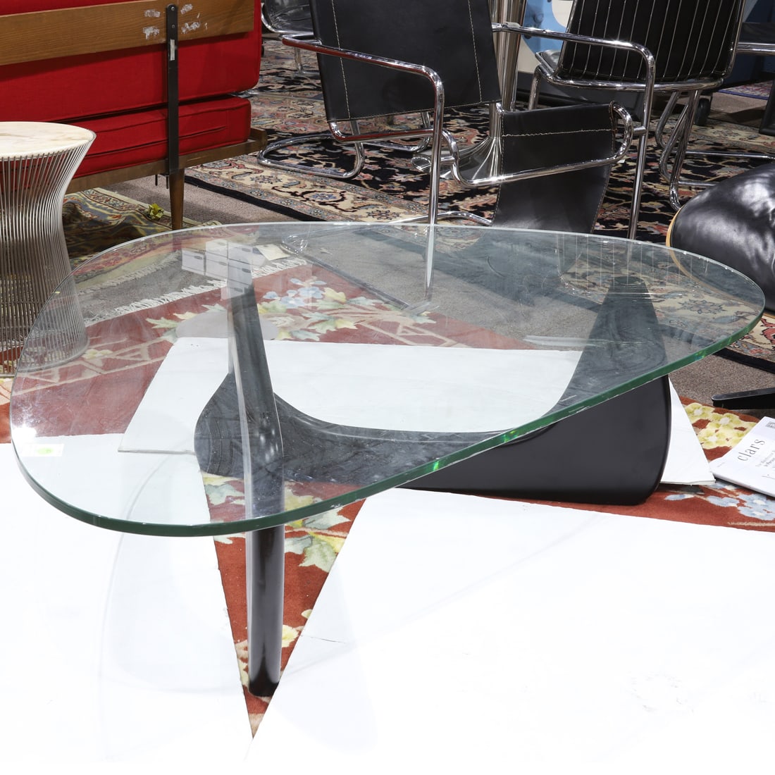 A Noguchi style glass and painted wood coffee table (1 of 2)