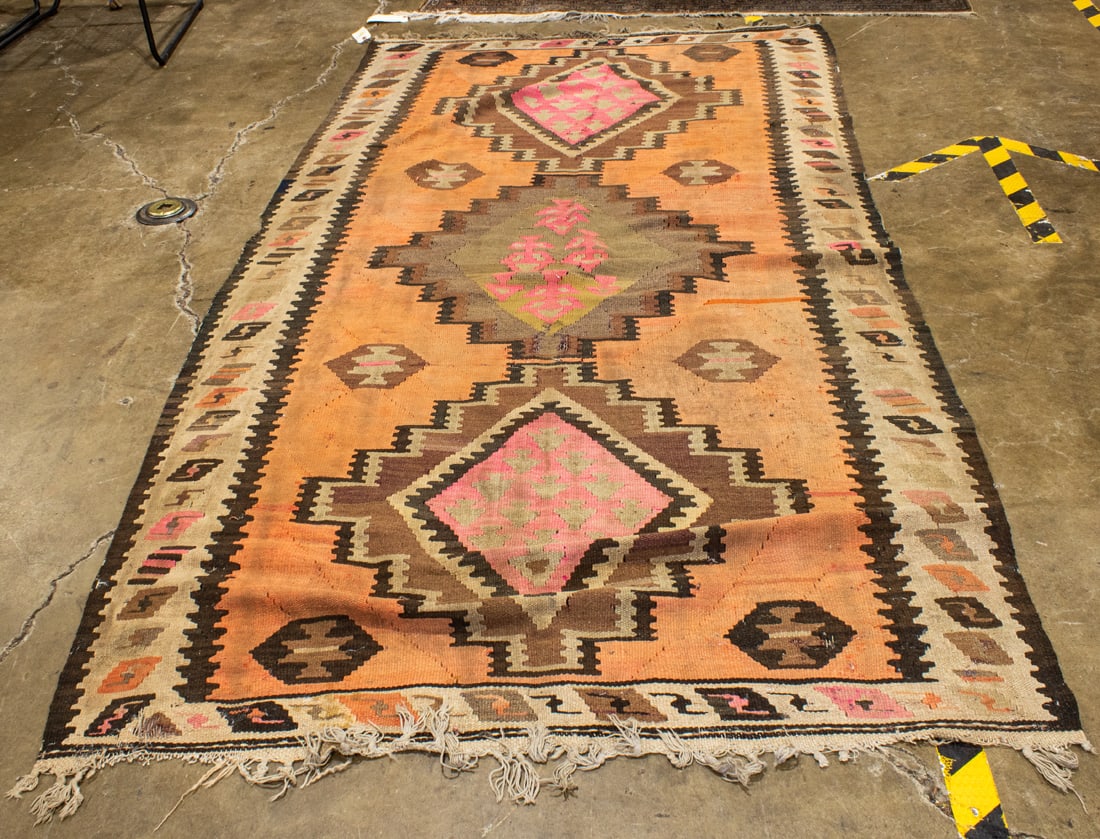 A Turkish kilim rug: A Turkish kilim rug, approximately 4'11" x 7'11"