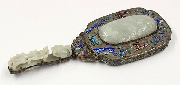 Chinese Enameled Repousse Mirror with Jade Plaque: Chinese hand held mirror with jade plaques, late Qing/early Republic period, the back of the mirror centered with a celadon jade ovoid plaque carved with three rams below a taiji symbol forming the re