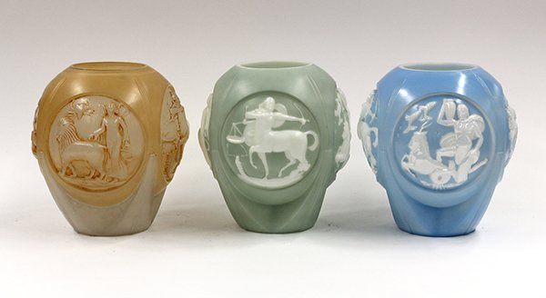 Phoenix Art Glass: (lot of 3) Phoenix art glass Zodiac vases in light blue to lustre, orange to clear, and light green to cream, 10''h. Provenance: Property from the forty-year private collection of Alan Goldfield, a re