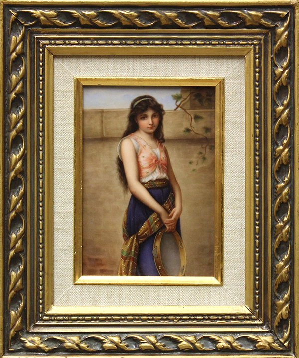 Framed porcelain plaque: Berlin hand painted plaque, depicting a Gypsy girl dressed in traditional attire and bearing a tambourine, verso marked Mignon/ nach G Hom, plaque size 7''h x 5''w