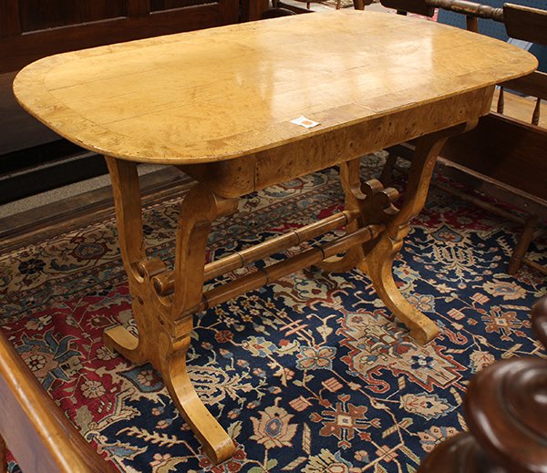 Biedermeier writing table: Biedermeier writing table, Austria 19th century, the band inlaid top of oval form, above the blind single drawer apron rising on lyre form supports terminating on outswept feet, 32''h x 47''w x 25.5''