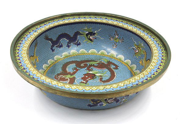 Chinese Cloisonne Basin: Chinese large cloisonne enamel basin, the interior well with a meandering red dragon on a turquoise ground, and the sides with a pair of yellow dragons alternating with blues ones pursuing flaming jew