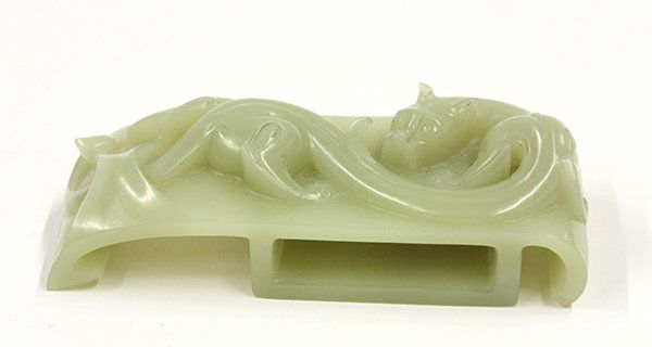 Chinese Jade Sword Slide: Chinese chilong jade sword slide, the even tone seagreen matrix relief carved with a scrolling sinuous chilong climbing through an opening, 3.6''w