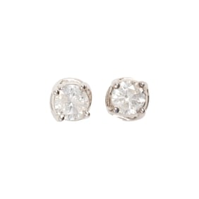 A pair of diamond and 14k white gold stud earring