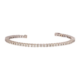 A diamond and 14k gold bracelet