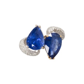 A sapphire, diamond and 18k white gold ring