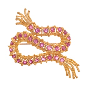 A ruby and 18k gold brooch