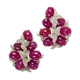 A pair of ruby, diamond and silver earrings