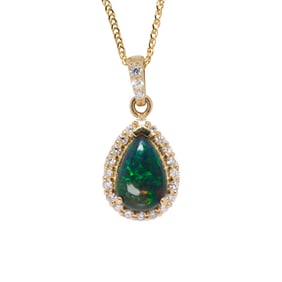 A treated opal, diamond and 14k gold pendant necklace
