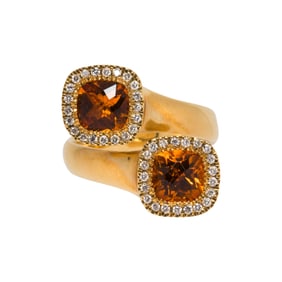 A topaz, diamond and 14k gold ring