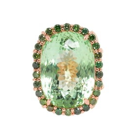 A Green tourmaline and 14k rose gold ring