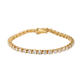 A diamond and 18k gold line bracelet