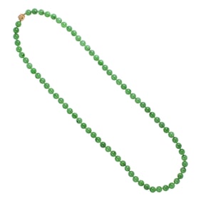 A Jade and 14k gold necklace
