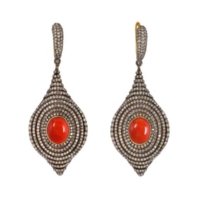 A pair of coral, diamond, 14k gold and silver earrings