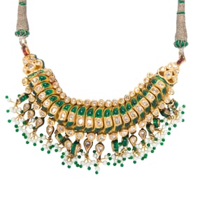 An indian diamond, enamel and high karat gold necklace