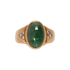 A green tourmaline, diamond and 14k gold ring