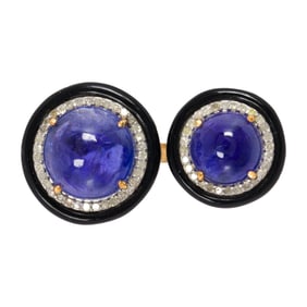 A tanzanite, onyx, diamond, silver and 14k gold ring