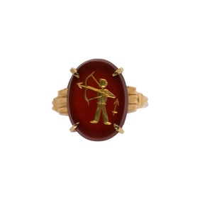 A carnelian and 14k gold ring