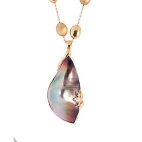 A blister pearl, diamond and 14k gold pendant-enhancer and chain