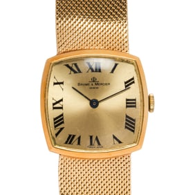 A Baum Mercier 14k gold wristwatch