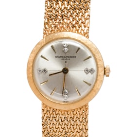 A Baume & Mercier diamond and 14k gold wristwatch