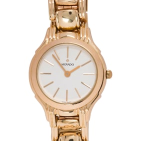 A Movado 14k gold wristwatch