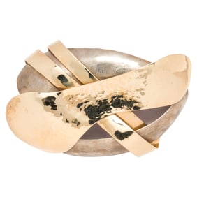 A 14k gold and silver brooch