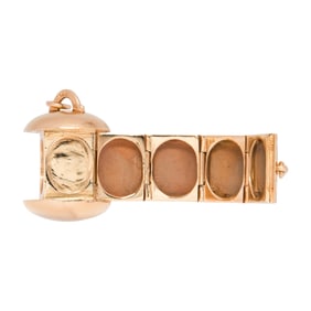 An antique multi-photo locket pendant