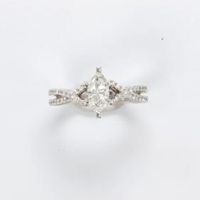 A platinum and diamond ring