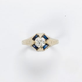 A diamond, sapphire and 14k ring