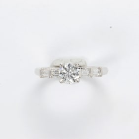 A diamond and platinum rings