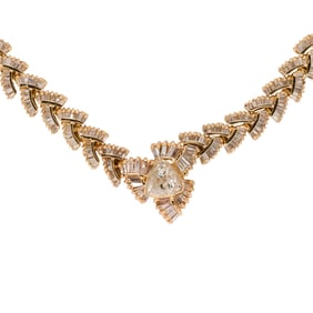 A diamond and 14k gold necklace