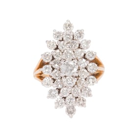 A diamond and 14k gold ring