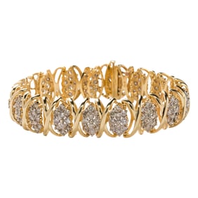 A diamond and 14k gold bracelet