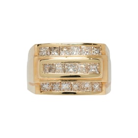 A diamond and 14k gold mens ring