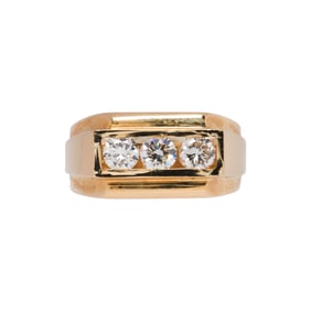 A diamond and 14k gold ring
