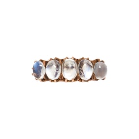 An antique moonstone and 14k gold ring