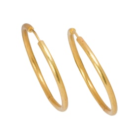 A pair of 18k gold hoop earrings