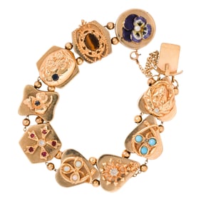 A gemstone and 14k gold bracelet