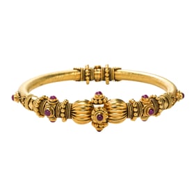 A Indian ruby and high karat gold bangle