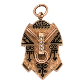 A Victorian black enamel and 14k gold mourning locket