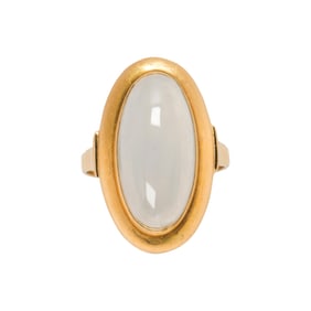 A moonstone and 14k gold ring