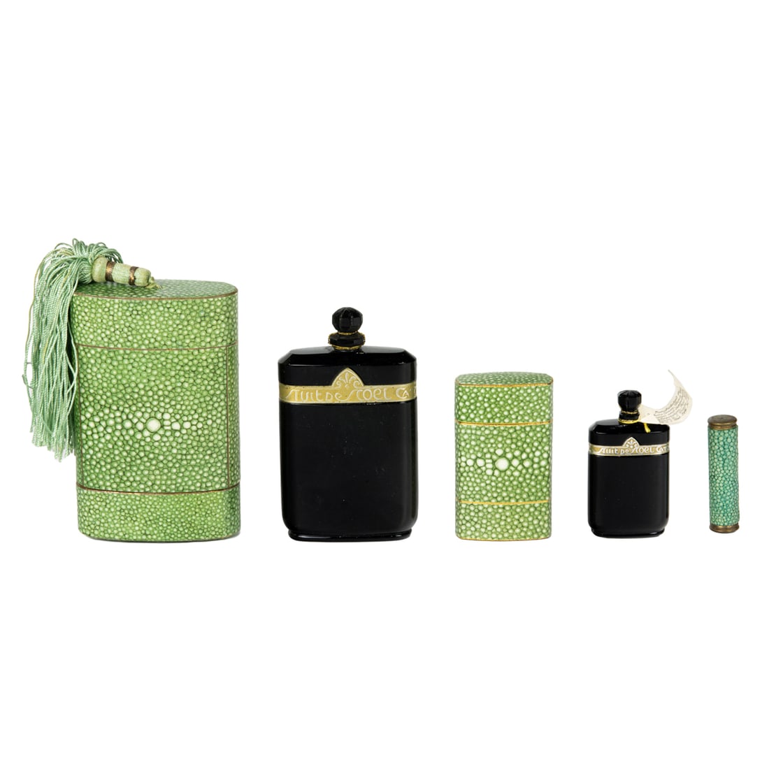 Two Caron 'Nuit de Noe' black glass perfume bottles with boxes: Two Caron 'Nuit de Noe' black glass perfume bottles in graduated sizes with original faux shagreen boxes, bottles 2.75"h and 4.25"h, en suite with a shagreen lipstick case [3 total]