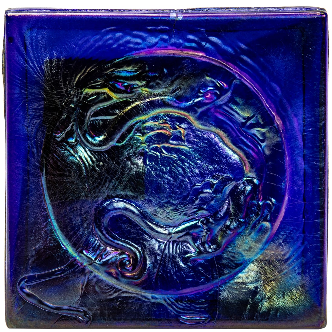 A Tiffany Studios Favrile glass dragon tile: A Tiffany Studios Favrile glass dragon tile, unmarked, 4"w x 4"d